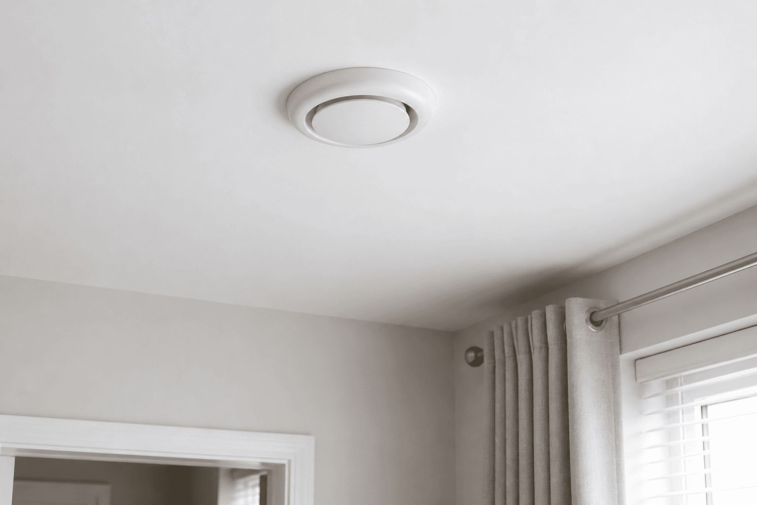 Ceiling diffuser delivering fresh air from a PIV system in a home