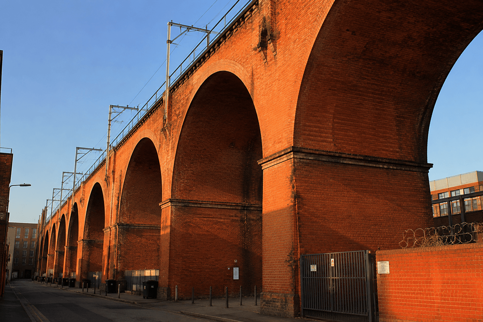 Stockport rooftops with the red brick viaduct